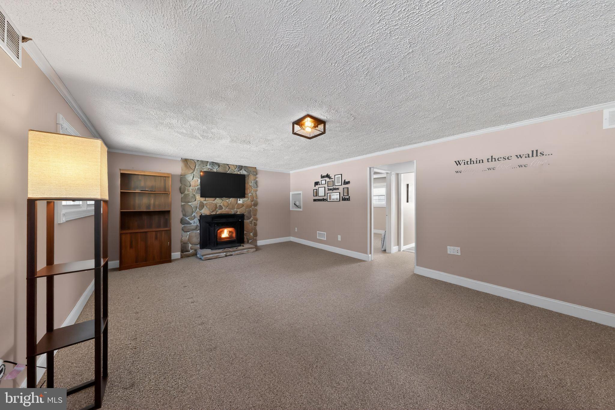 715 Darley Road Claymont, DE 19703 - Photo 13 of 43 Large lower level family room with fireplace