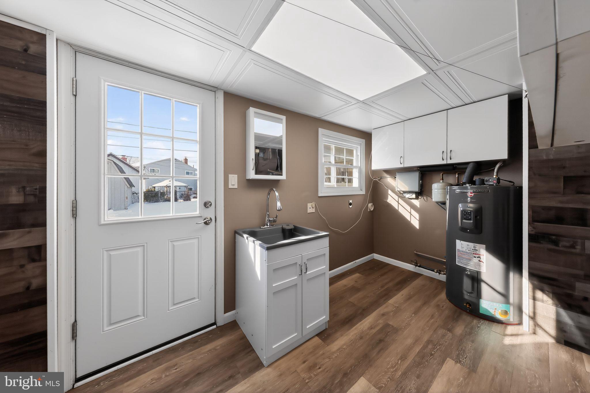 715 Darley Road Claymont, DE 19703 - Photo 16 of 43 Renovated laundry room with sink & utility space