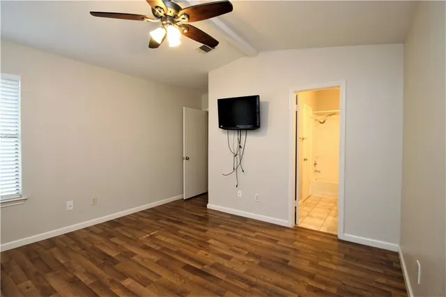 a view of a livingroom with a flat screen tv