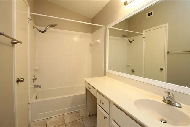a bathroom with a sink and a shower
