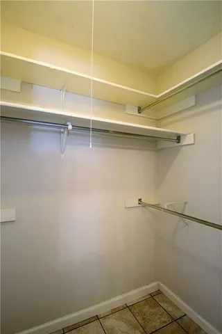 a view of a room with racks on the wall