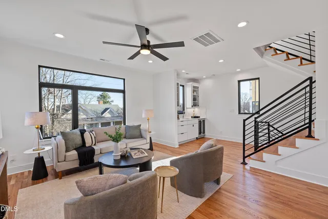 a living room with furniture or window and a wooden floor