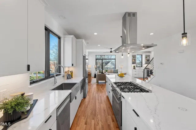 a bedroom with a large bed and a large window