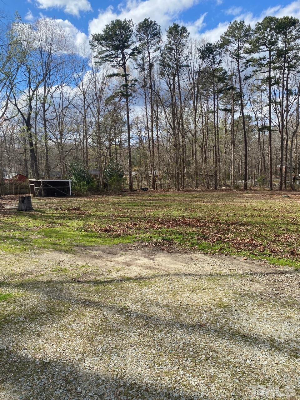 519 Goodwin Road Durham, NC 27712 - Photo 6 of 18 a view of a yard with large trees