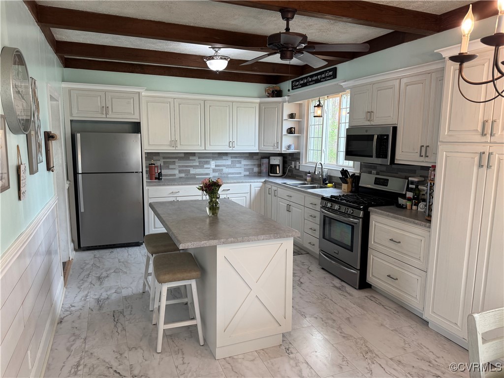Kitchen featuring all new cabinetry, stainless ste