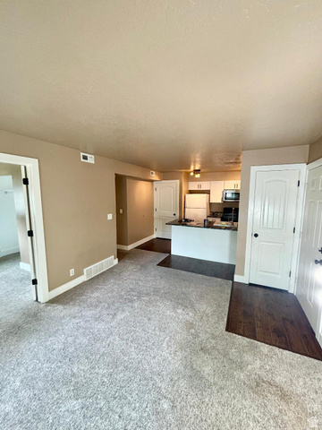 1212 East Waterside Cove, Unit 10 Midvale, UT 84047 - Photo 10 of 31 FAMILY ROOM FLOWS INTO THE KITCHEN AREA!