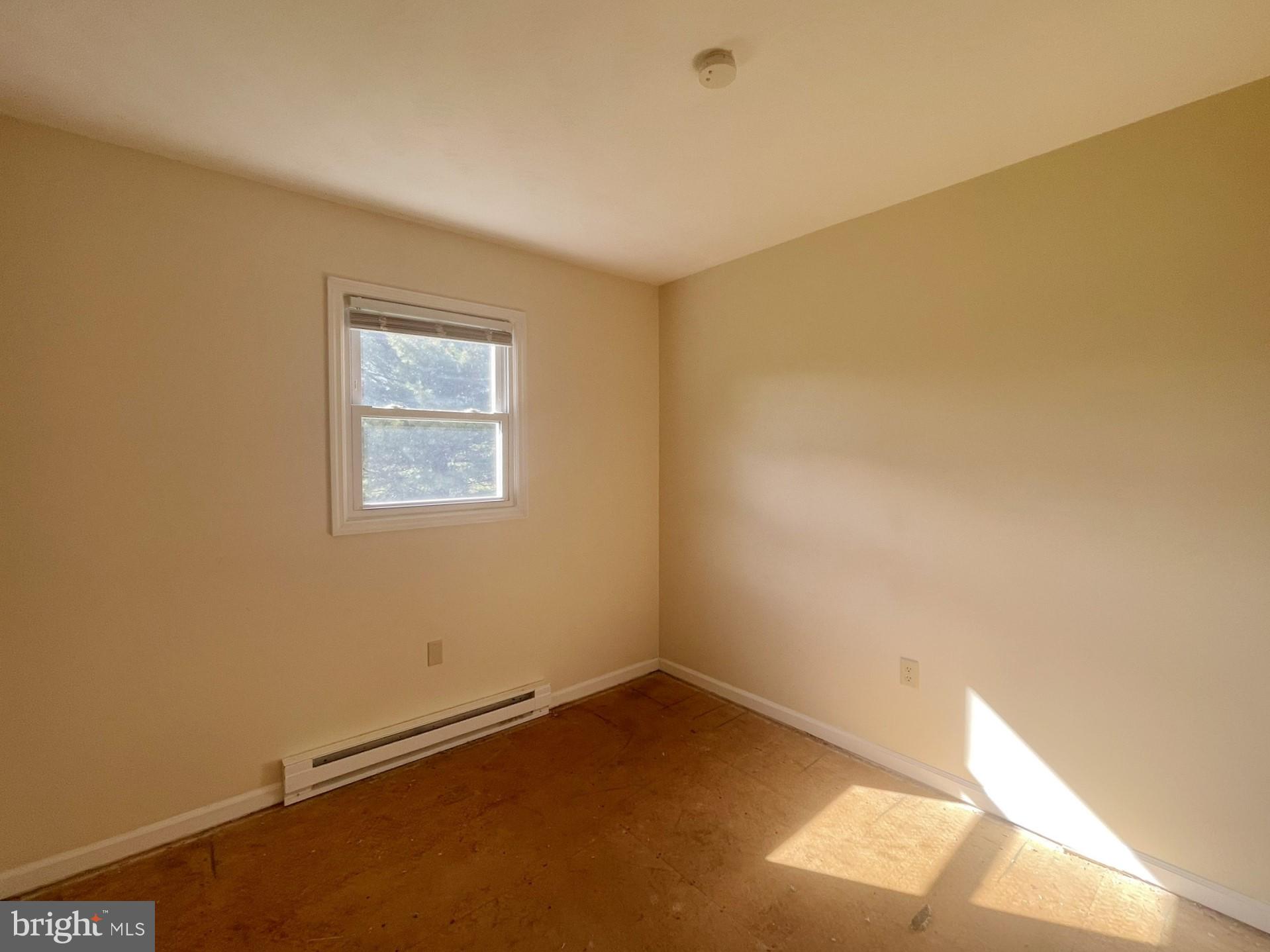 649 Shed Road Newville, PA 17241 - Photo 5 of 20 an empty room with a empty space and a window