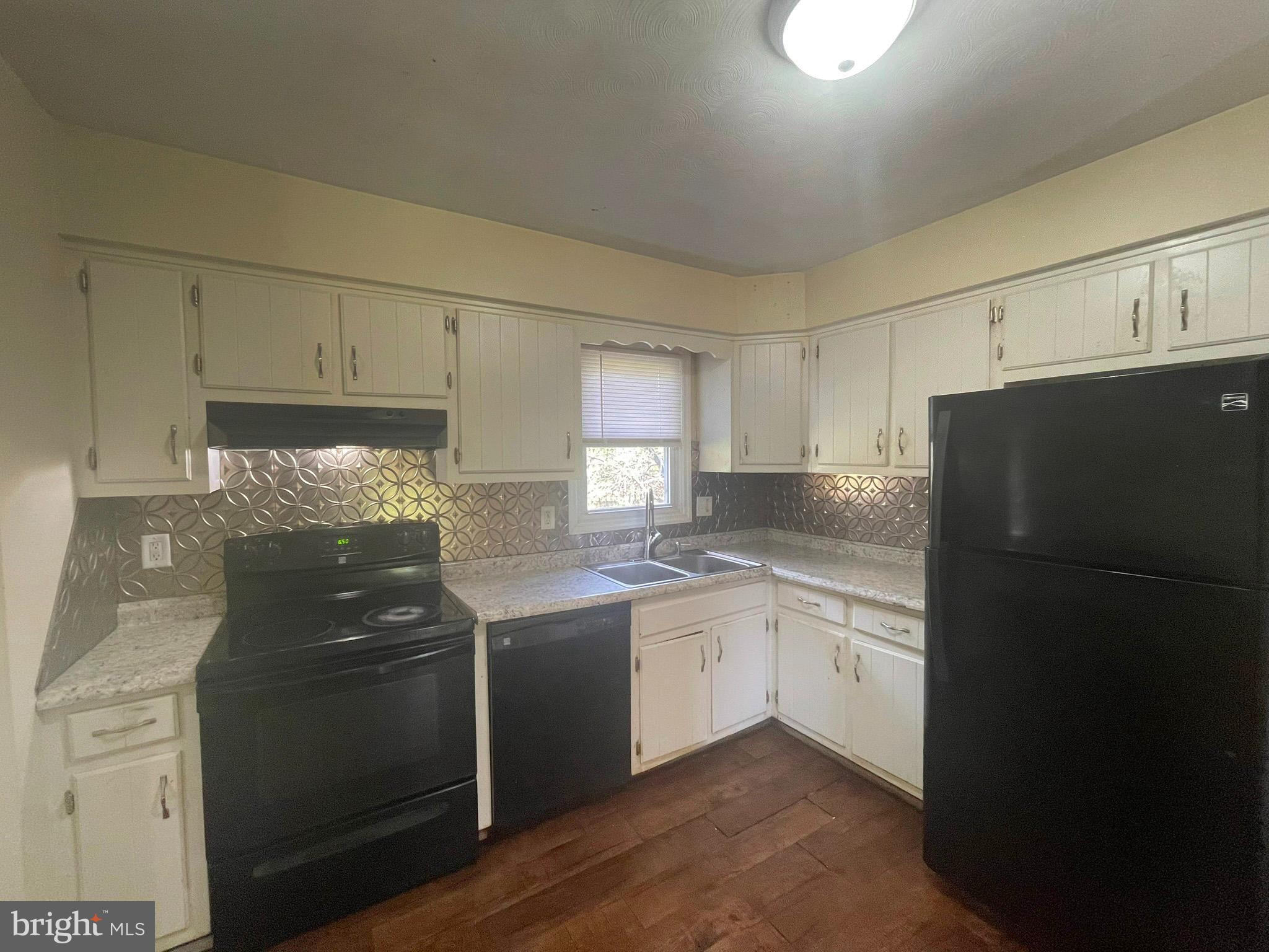 649 Shed Road Newville, PA 17241 - Photo 10 of 20 a kitchen with stainless steel appliances granite countertop a refrigerator a sink and white cabinets