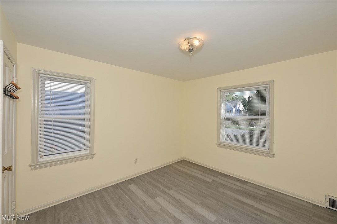 4033 Wyncote Road South Euclid, OH 44121 - Photo 12 of 25 Unfurnished room with hardwood / wood-style floors