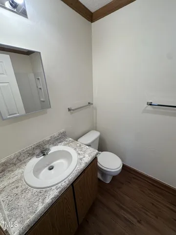 a bathroom with a sink and a toilet