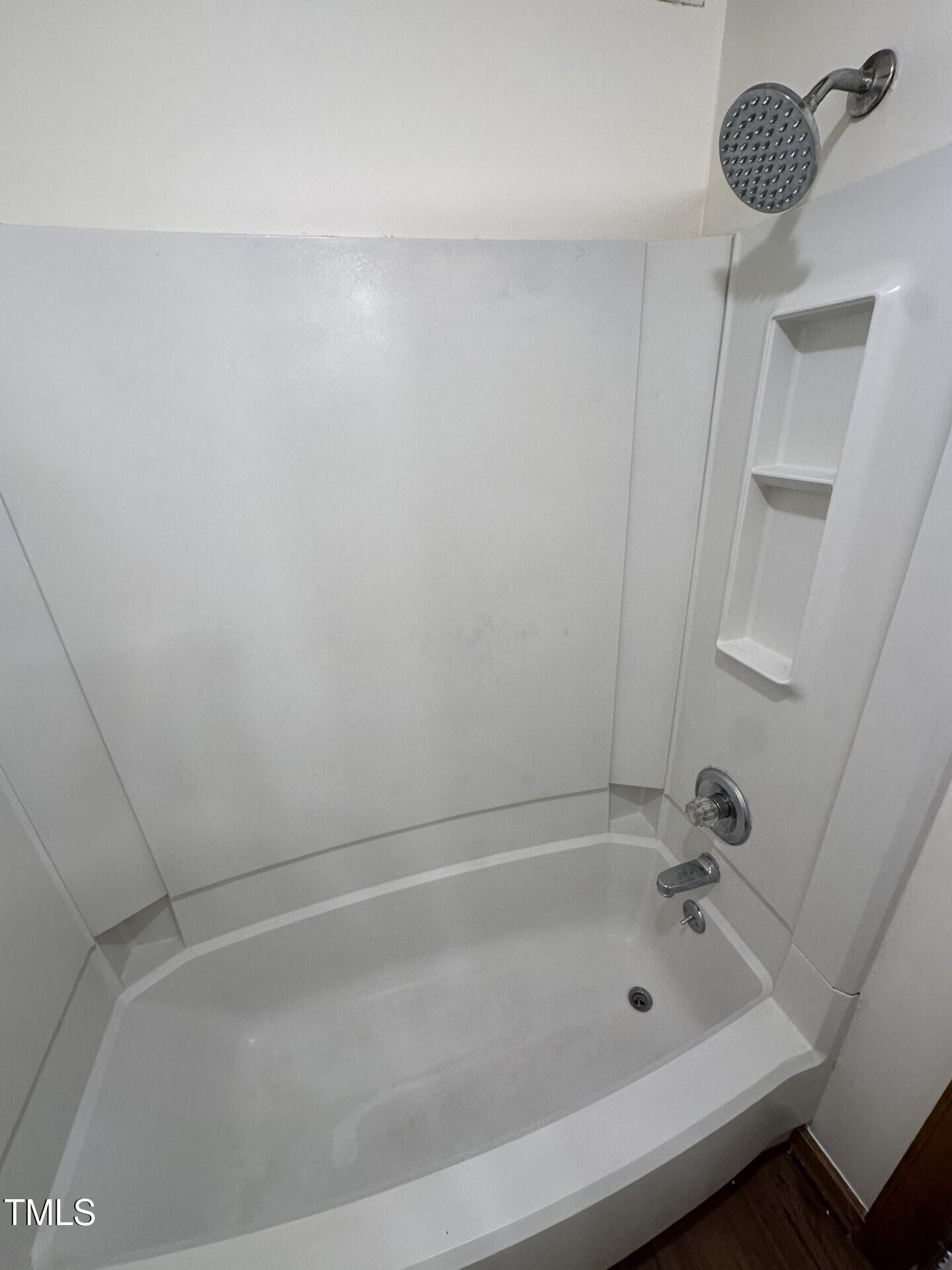 3605 Helix Court, Unit 201 Raleigh, NC 27606 - Photo 7 of 7 a bathroom with a bathtub