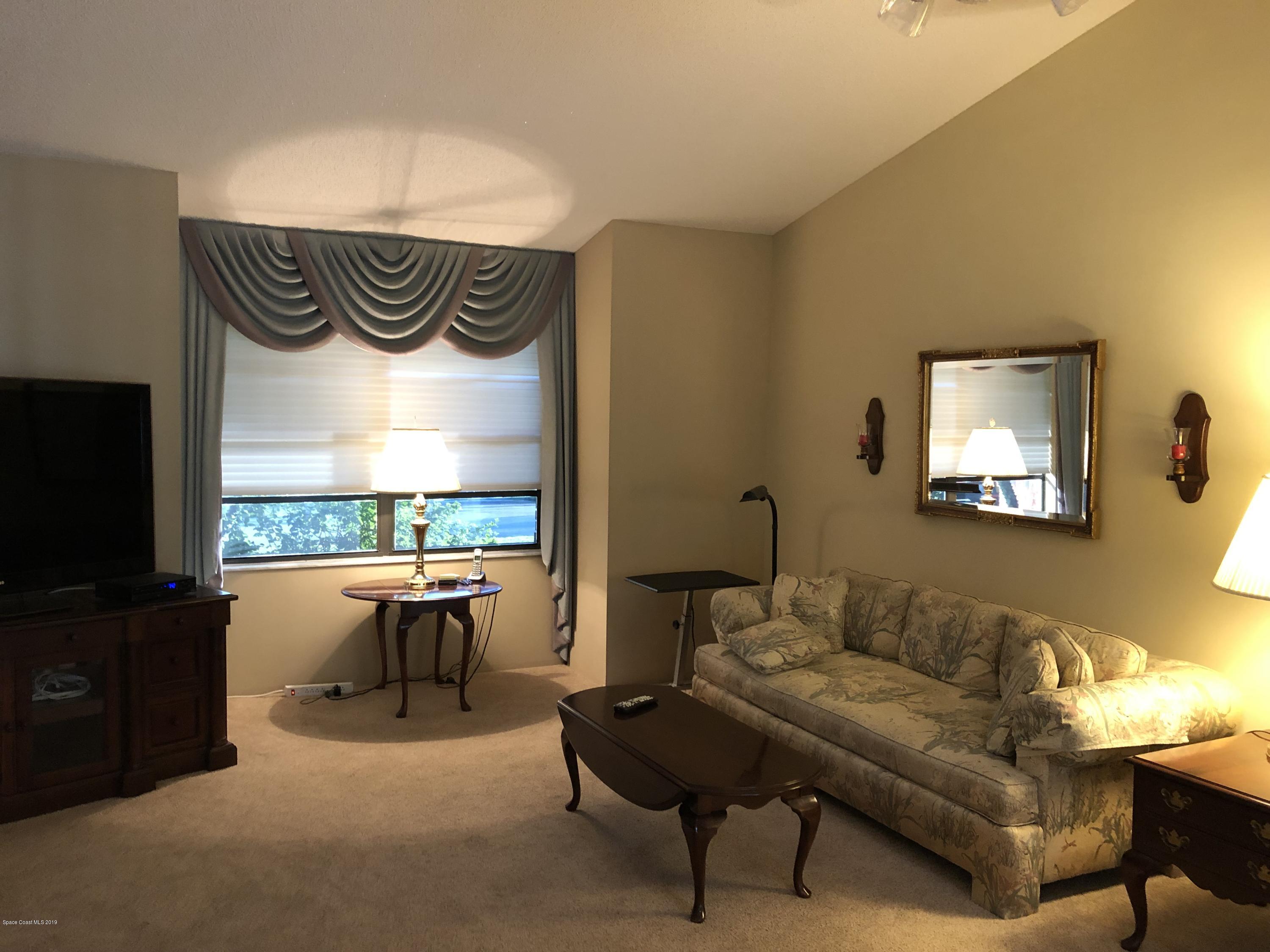 492 Rheine Road Northwest Palm Bay, FL 32907 - Photo 3 of 12 Living room