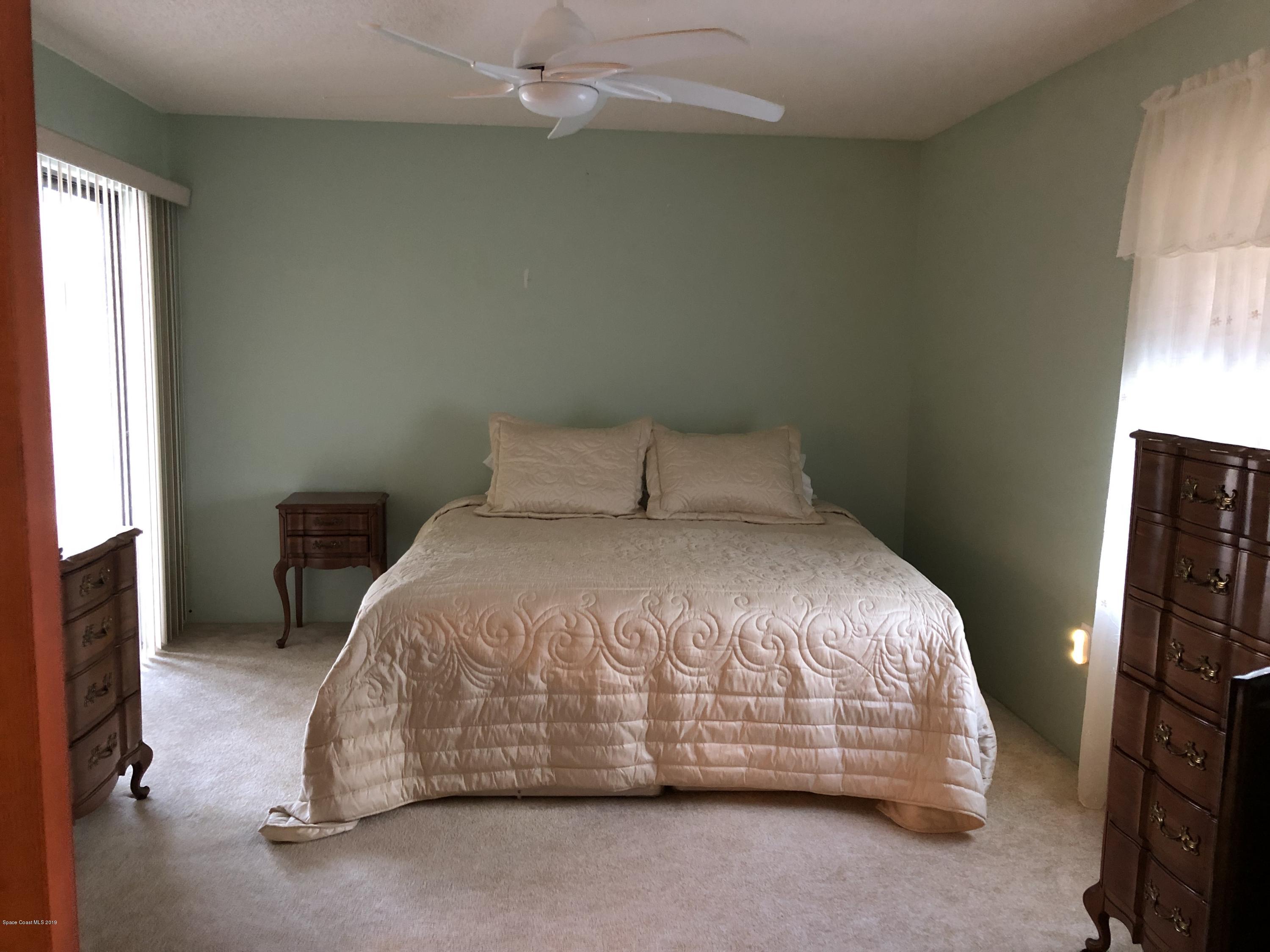 492 Rheine Road Northwest Palm Bay, FL 32907 - Photo 8 of 12 Master bedroom