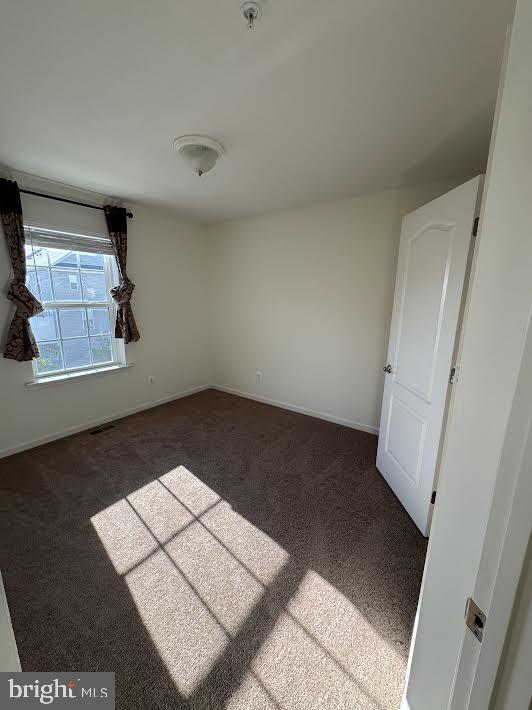 7806 Taggart Court Elkridge, MD 21075 - Photo 16 of 21 an empty room with windows