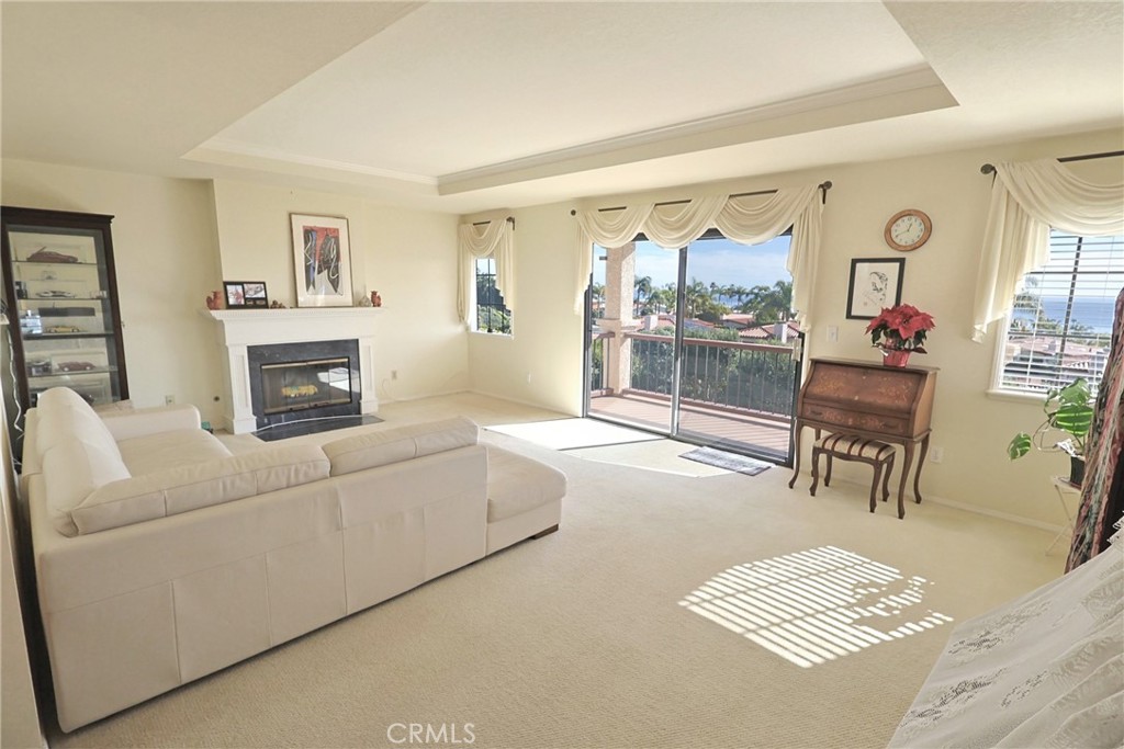 6508 Sandy Point Court Rancho Palos Verdes, CA 90275 - Photo 11 of 66 a living room with furniture and a fireplace