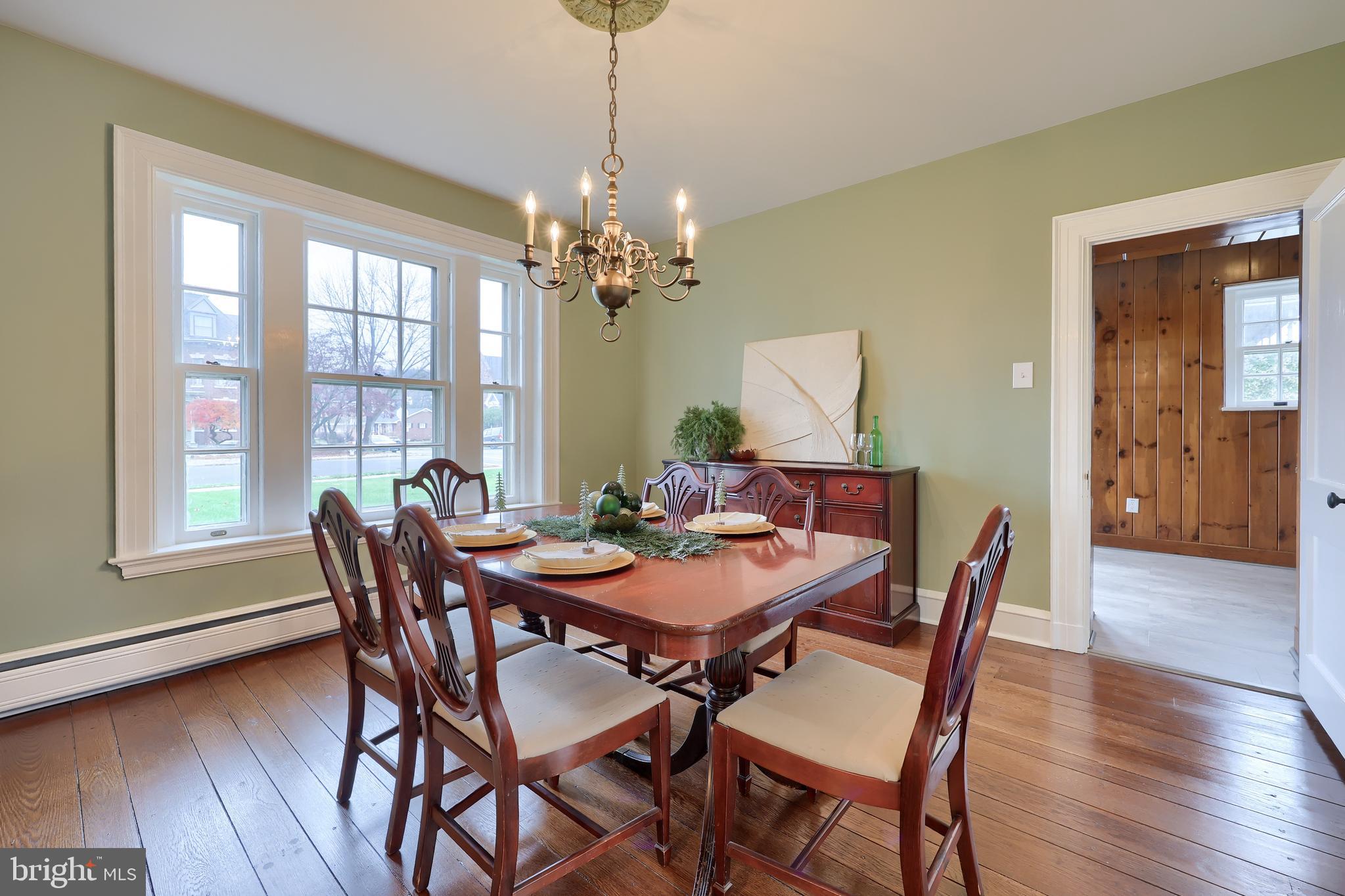 568 Chestnut Street Columbia, PA 17512 - Photo 11 of 68 a view of a dining room with furniture window and wooden floor