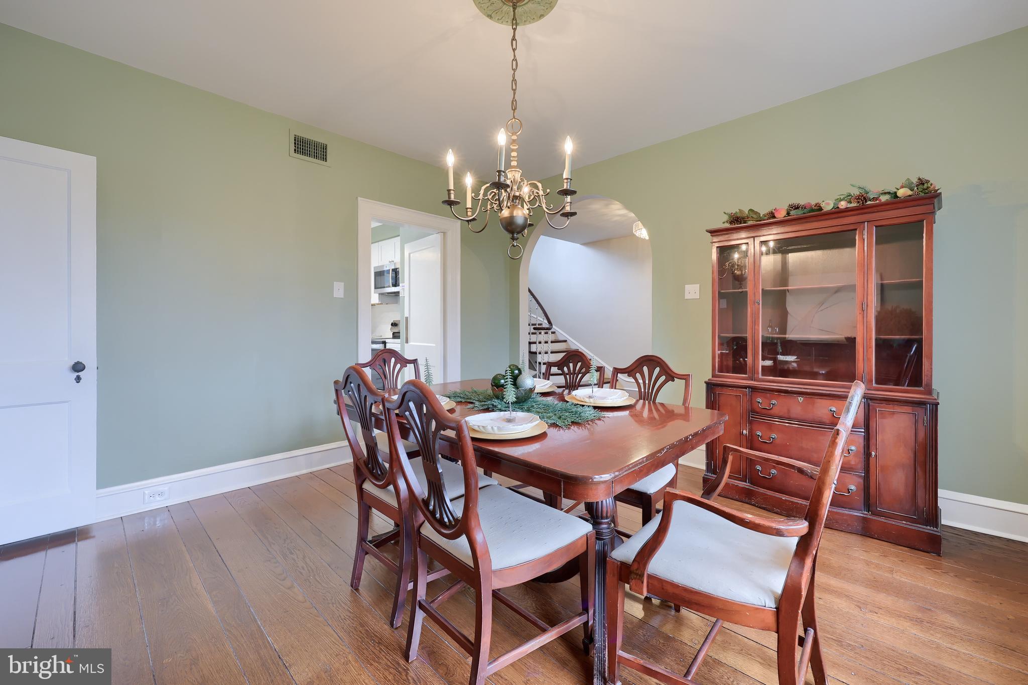 568 Chestnut Street Columbia, PA 17512 - Photo 13 of 68 a view of a dining room with furniture and wooden floor