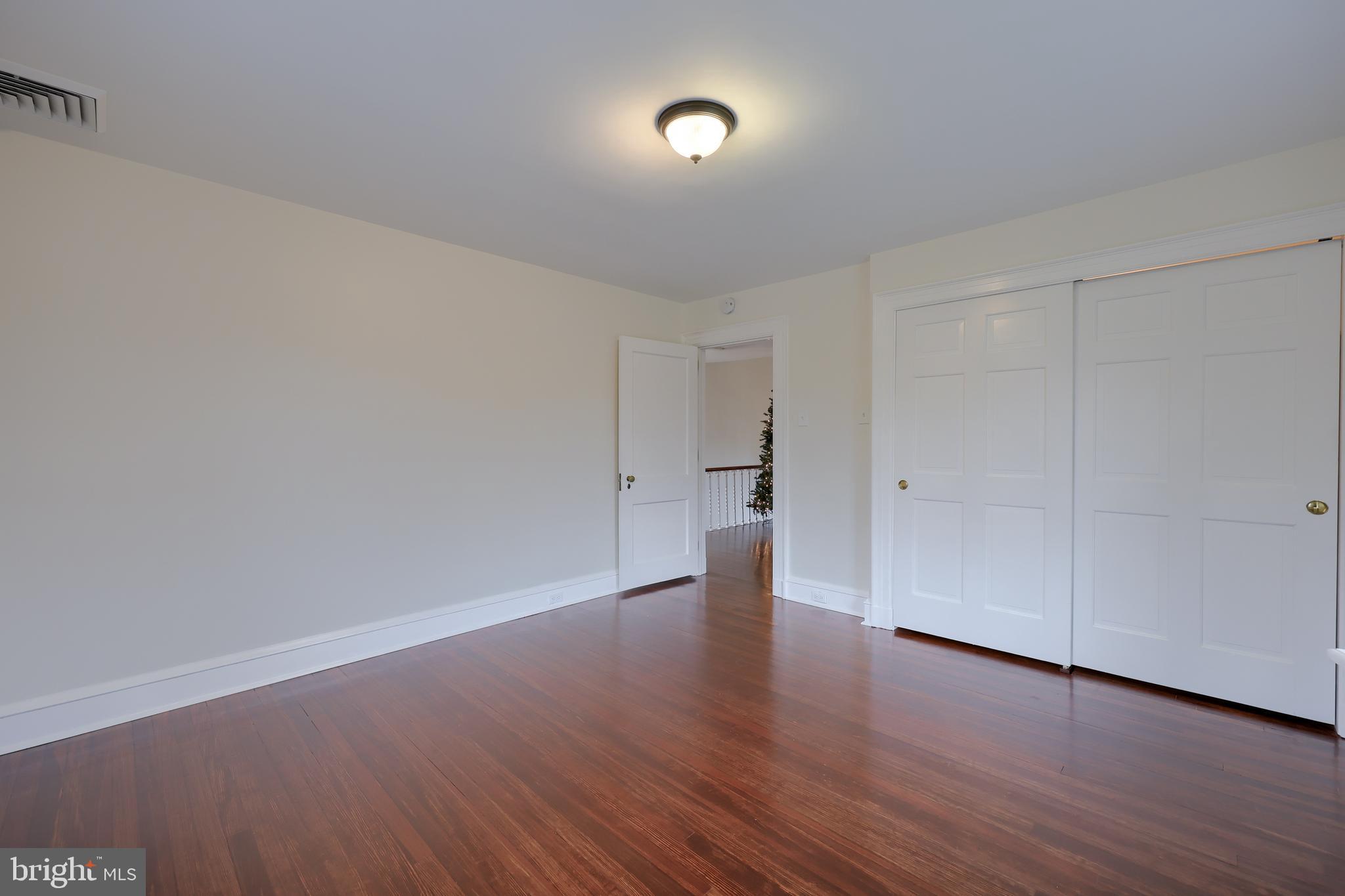 568 Chestnut Street Columbia, PA 17512 - Photo 37 of 68 a view of an empty room with wooden floor