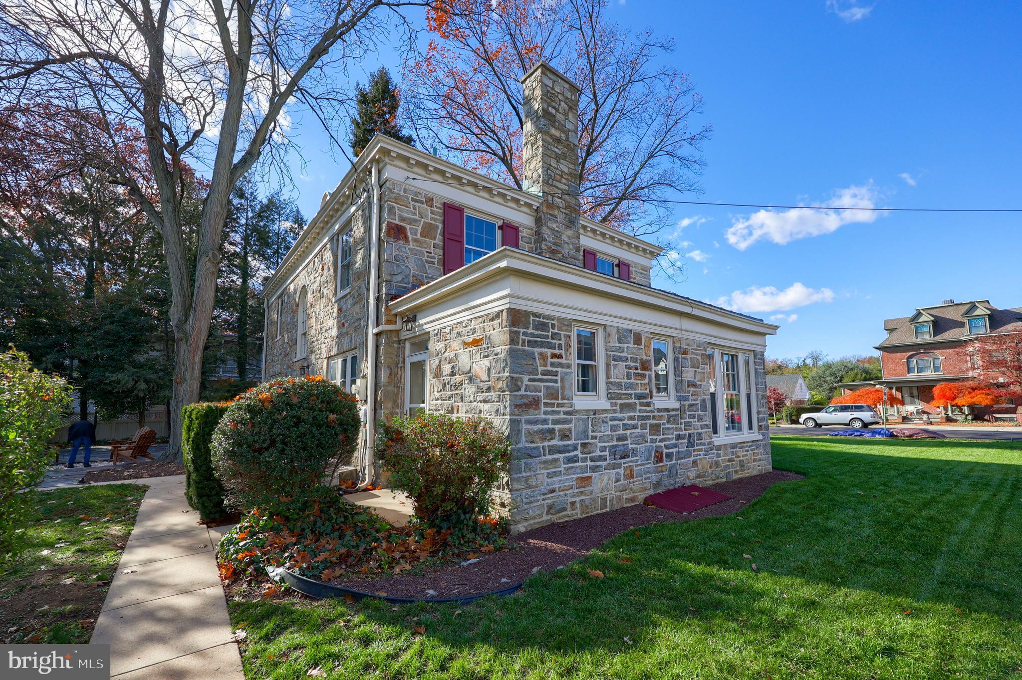 568 Chestnut Street Columbia, PA 17512 - Photo 56 of 68 a front view of a house with a yard and outdoor seating