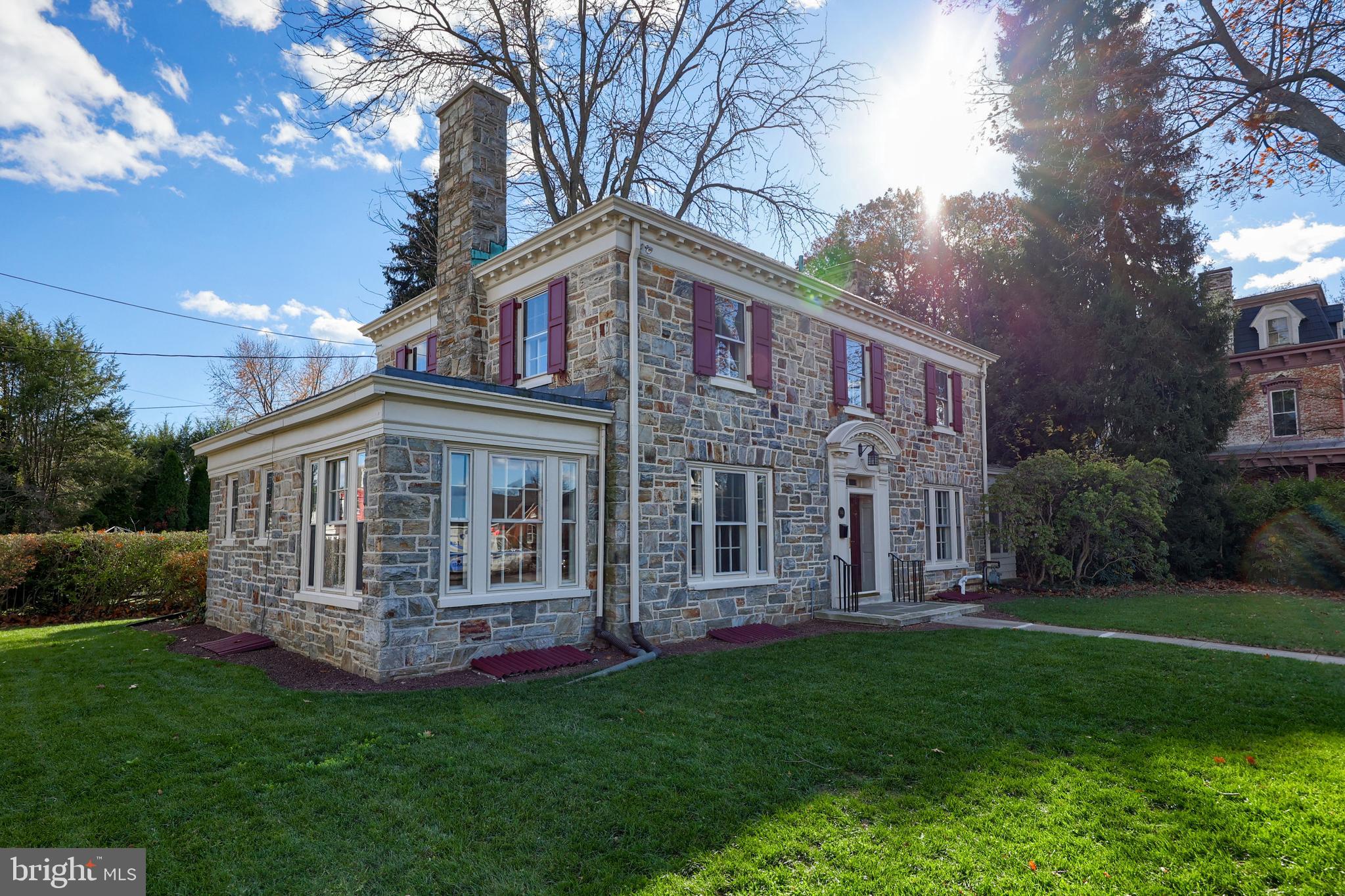568 Chestnut Street Columbia, PA 17512 - Photo 58 of 68 a view of a house with a yard and a large tree