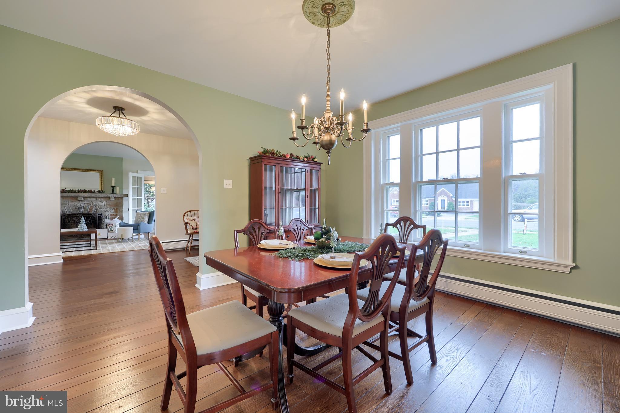 568 Chestnut Street Columbia, PA 17512 - Photo 10 of 68 a view of a dining room with furniture window and wooden floor