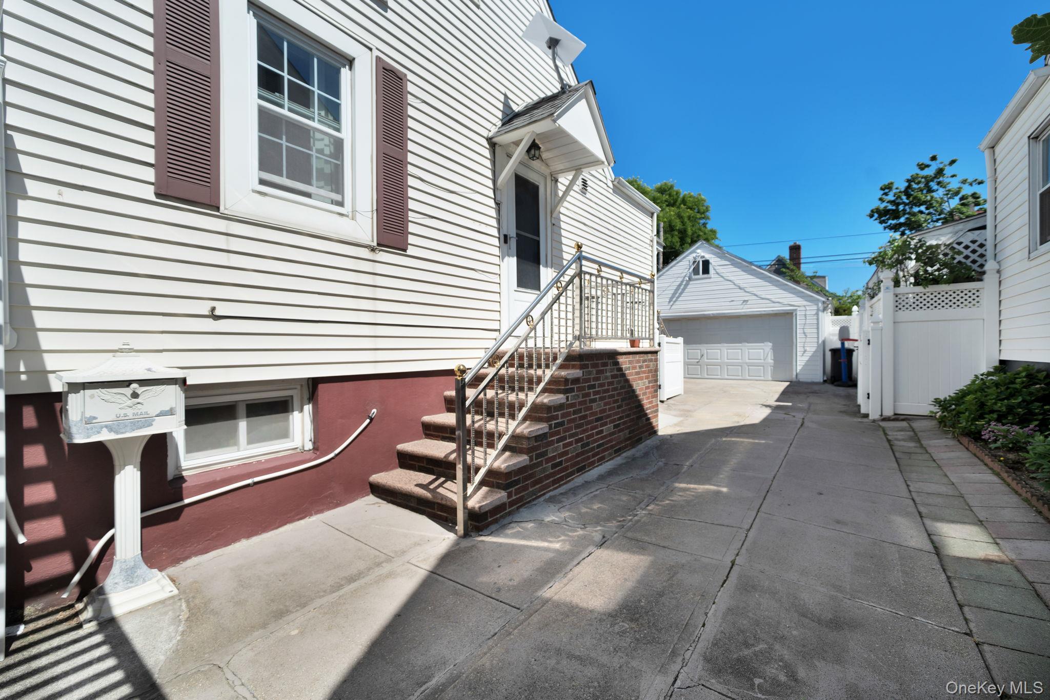 244-15 85th Road Queens, NY 11426 - Photo 30 of 30 Renovated Staircase Entrance within last 3 years.