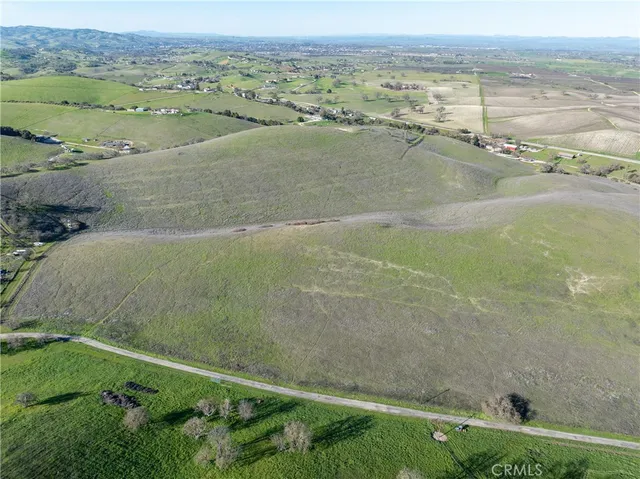 a view of an ocean and mountain