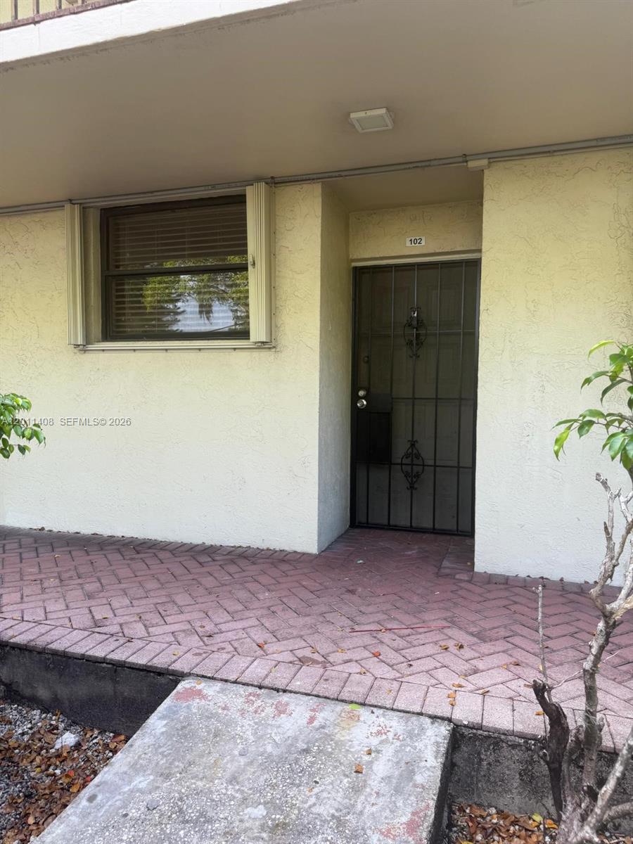 109 Lake Emerald Drive, Unit 102 Oakland Park, FL 33309 - Photo 1 of 13 a view of a room with wooden floor