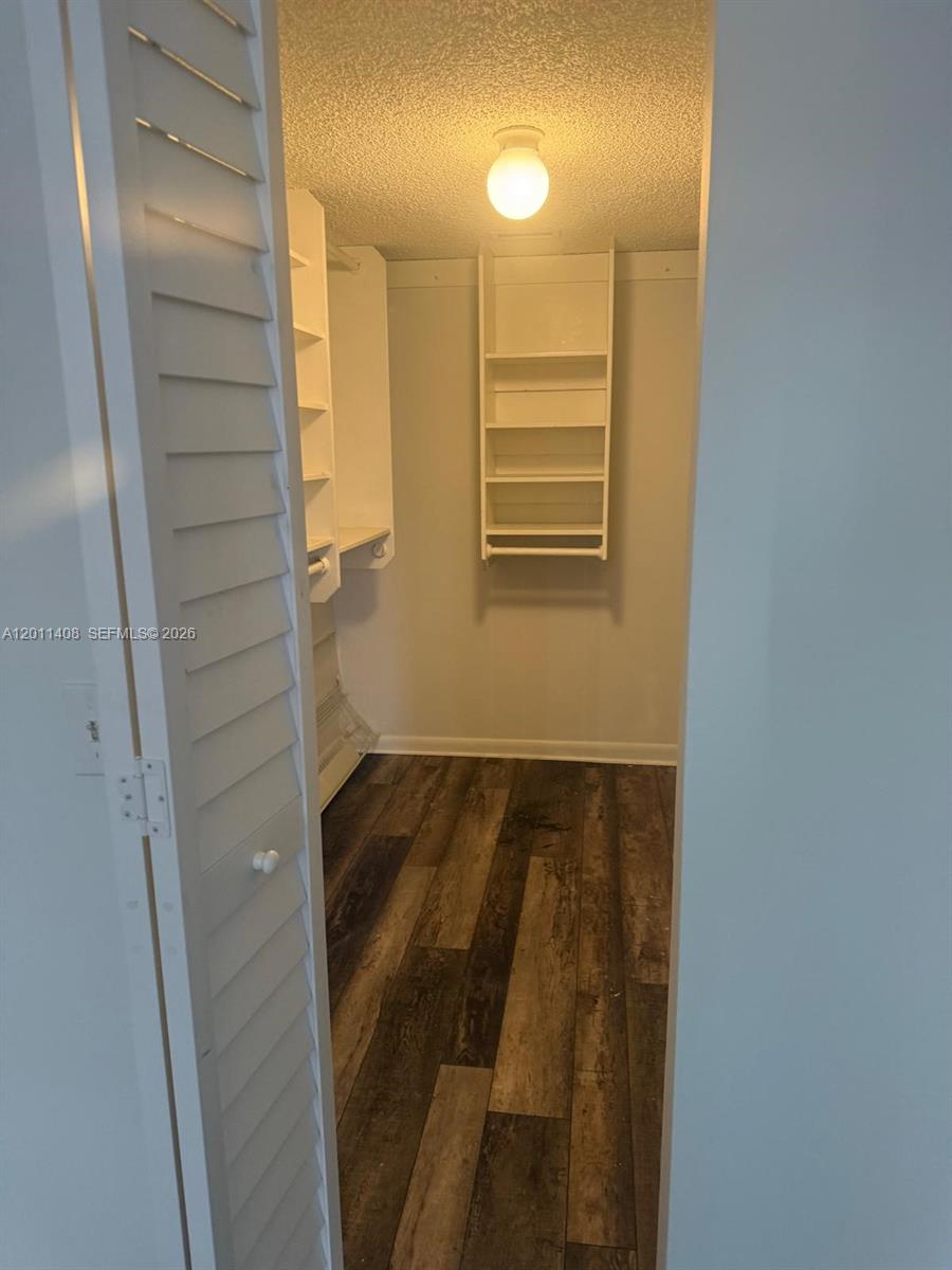 109 Lake Emerald Drive, Unit 102 Oakland Park, FL 33309 - Photo 9 of 13 a view of walk in closet