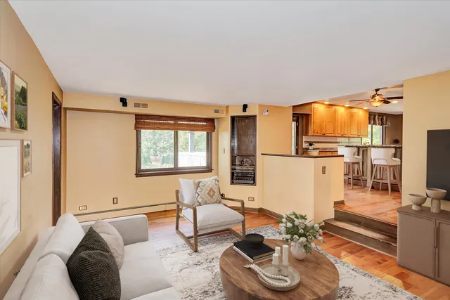 a bathroom with a sink a mirror and toilet