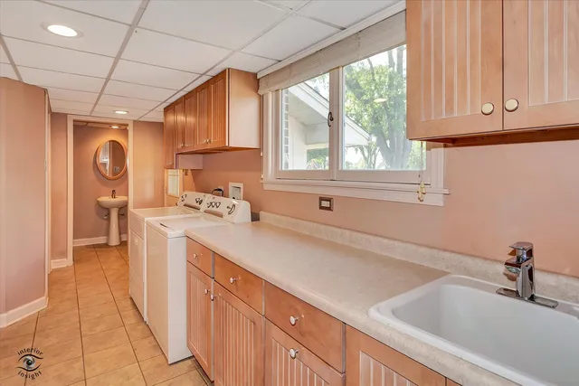 a spacious bedroom with a bed and a fireplace