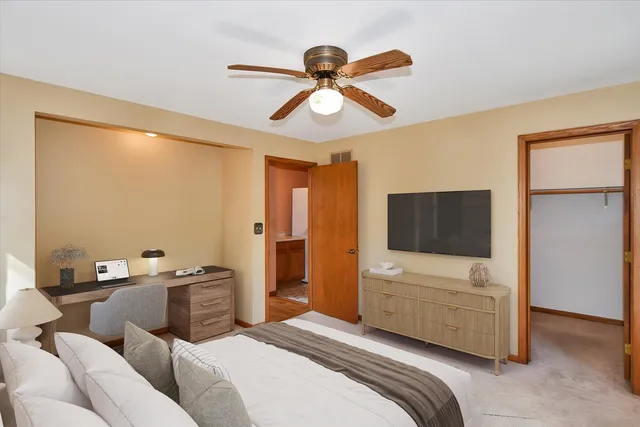 a view of a workspace with furniture