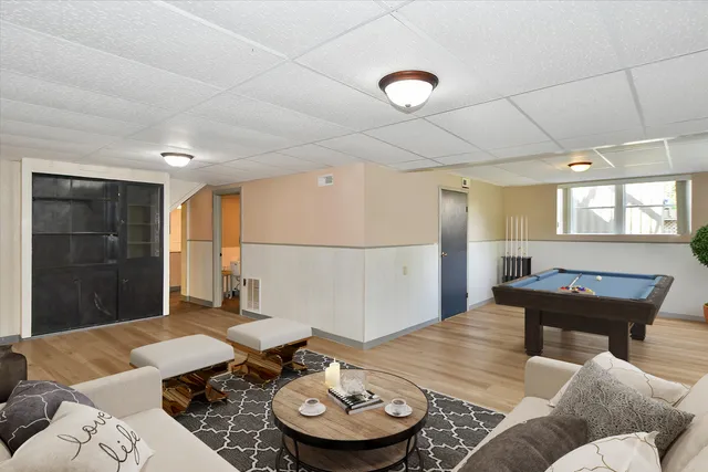 an aerial view of a house with a garden