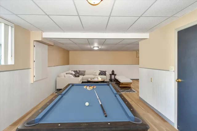 a view of outdoor space with green field and trees