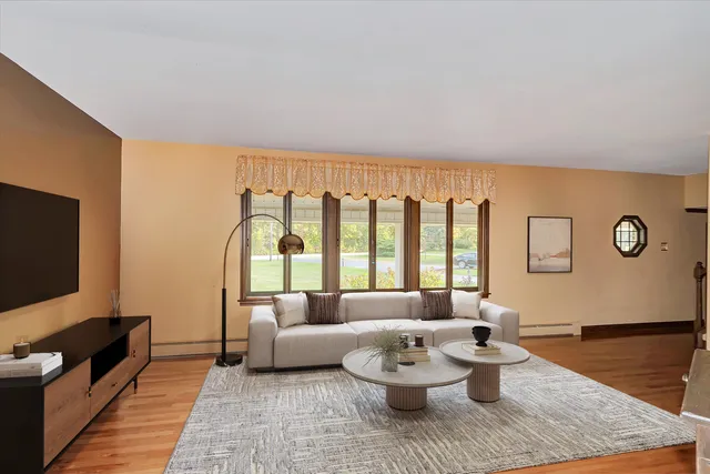 a view of a dining room with furniture window and outside view