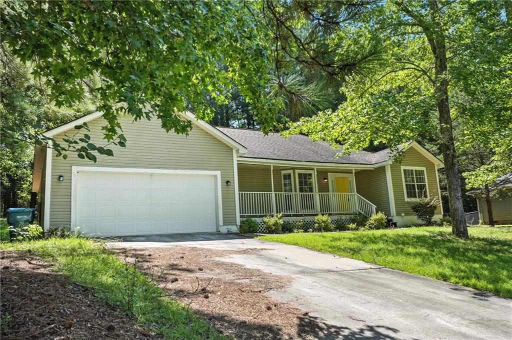 front view of a house with a yard