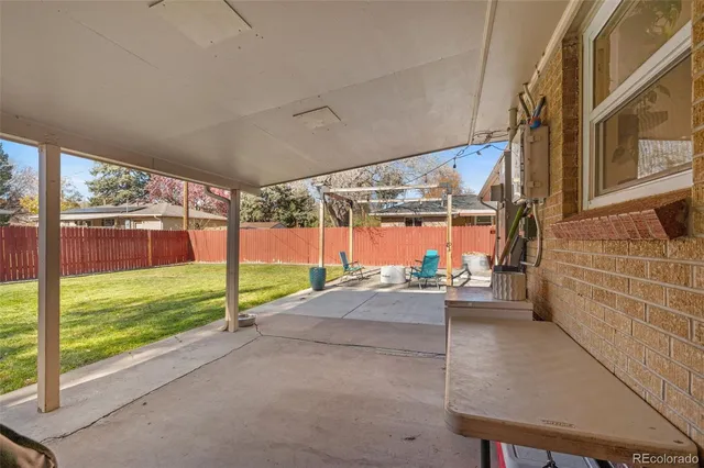 a view of a porch with hardwood