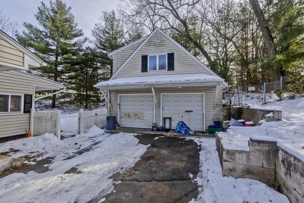 647 Plumtree Road Springfield, MA 01118 - Photo 20 of 23 a front view of a house with patio