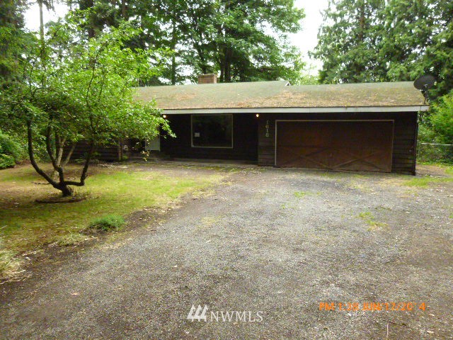 1618 194th Street Southeast Bothell, WA 98012 - Photo 1 of 20 a backyard of a house with lots of green space
