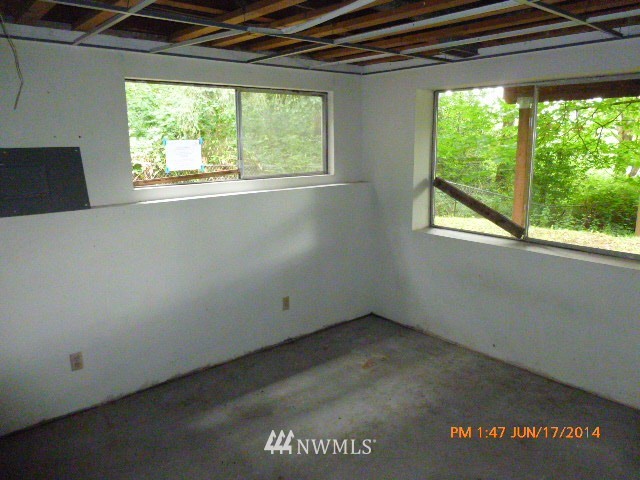 1618 194th Street Southeast Bothell, WA 98012 - Photo 17 of 20 a view of an empty room with a window