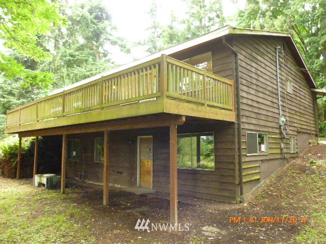 1618 194th Street Southeast Bothell, WA 98012 - Photo 4 of 20 a front view of a house with a yard