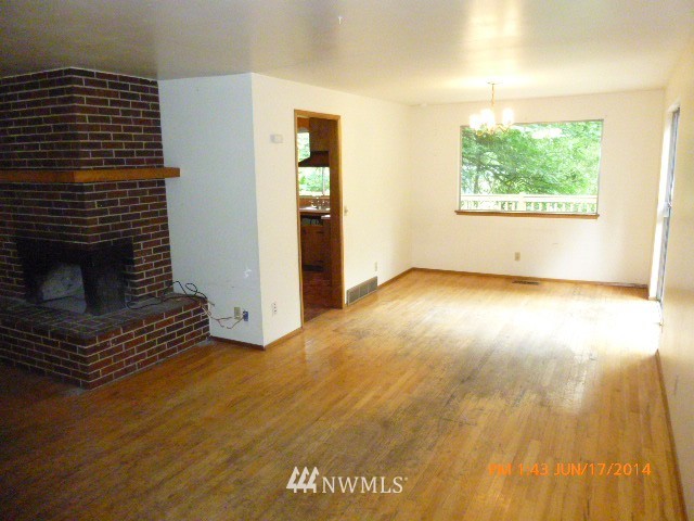 1618 194th Street Southeast Bothell, WA 98012 - Photo 6 of 20 an empty room with windows