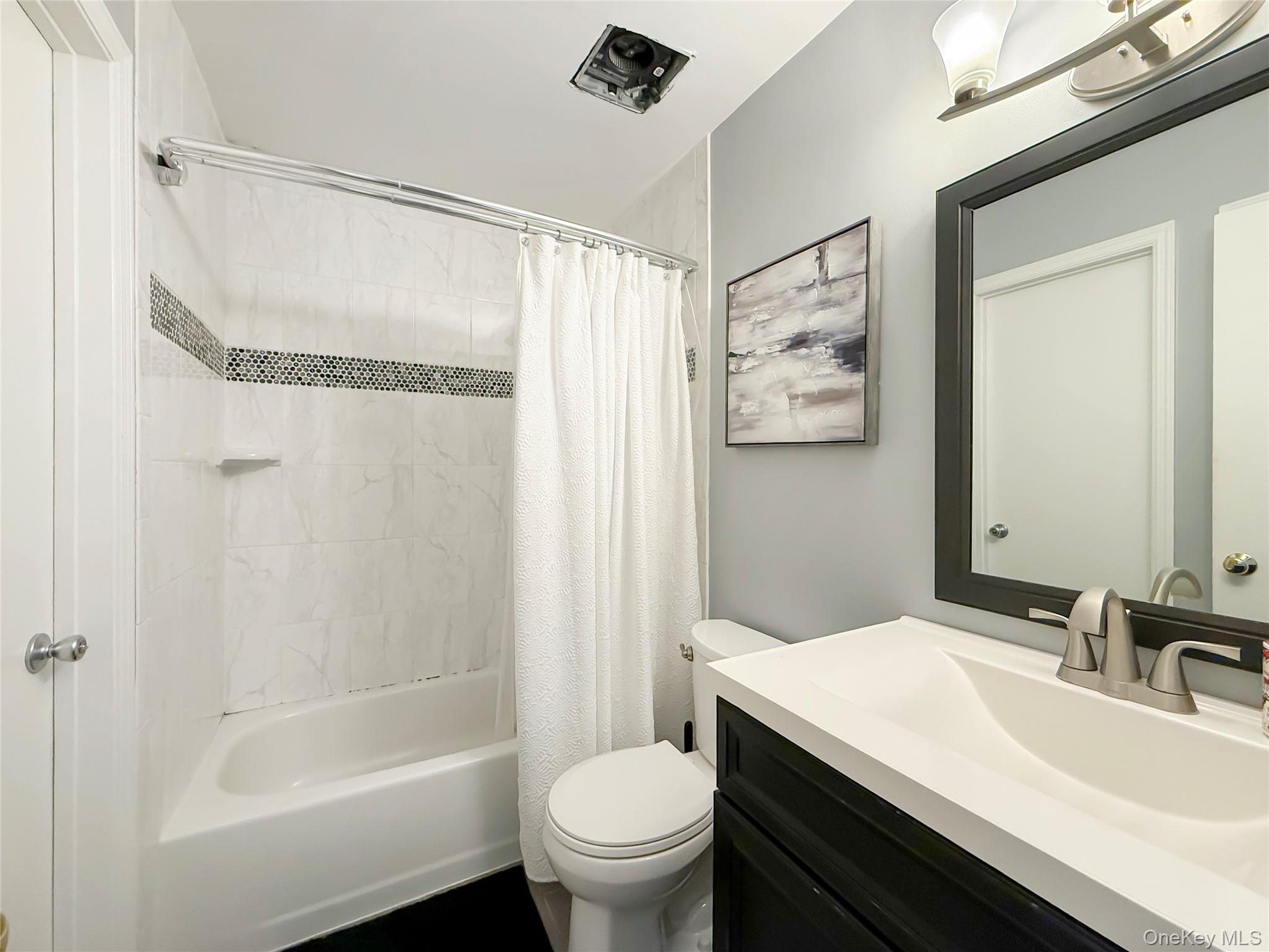 4508 Whispering Hills Road Chester, NY 10918 - Photo 19 of 20 a bathroom with a granite countertop sink toilet and shower