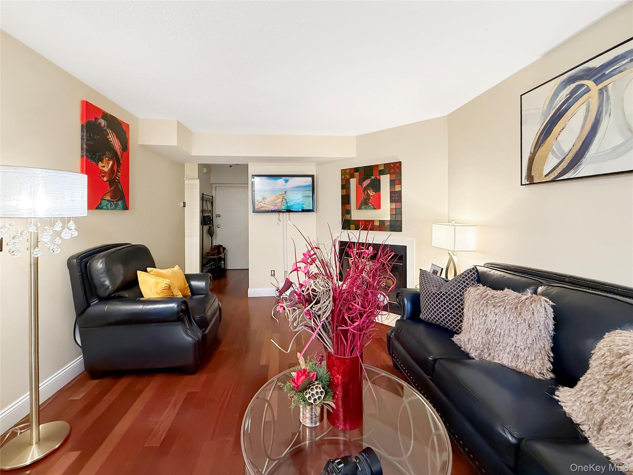 4508 Whispering Hills Road Chester, NY 10918 - Photo 5 of 20 a living room with furniture and a flat screen tv
