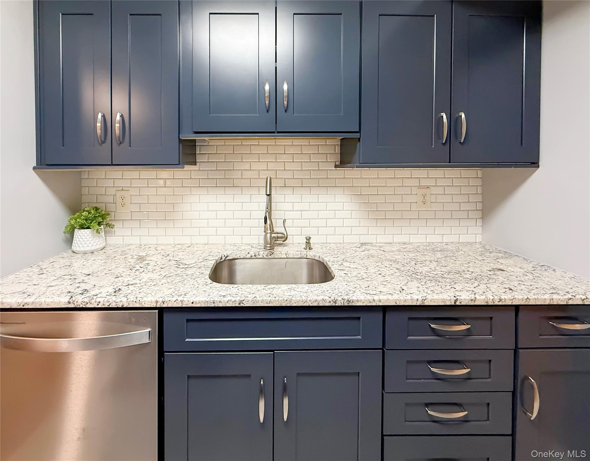 4508 Whispering Hills Road Chester, NY 10918 - Photo 10 of 20 a kitchen with granite countertop cabinets and window