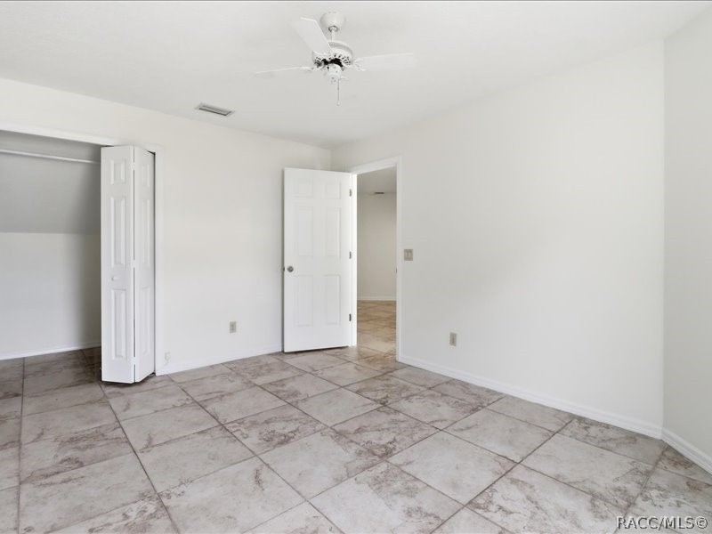 709 Moray Drive Inverness, FL 34453 - Photo 21 of 55 Downstairs 4th bedroom with oversized closet