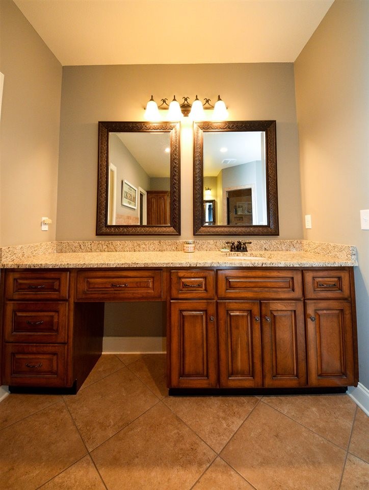 1460 No Pone Road Georgetown, TN 37336 - Photo 25 of 33 a bathroom with a granite countertop double vanity sink and a mirror