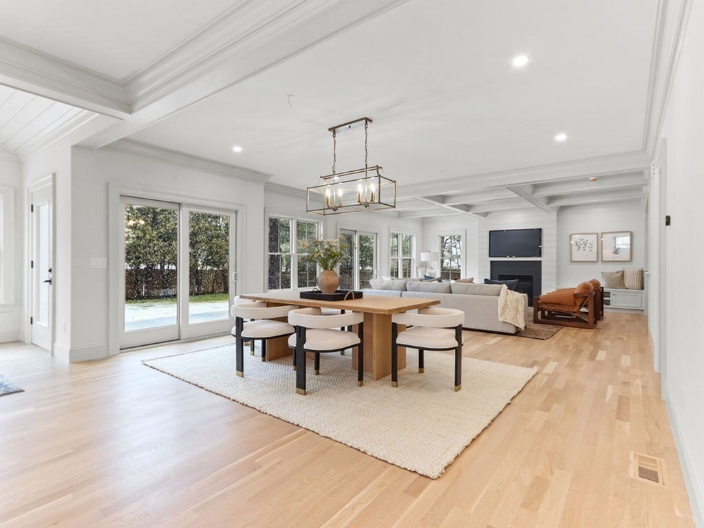 31 Karen Road Newton, MA 02468 - Photo 11 of 41 a living room with lots of furniture a chandelier and a rug