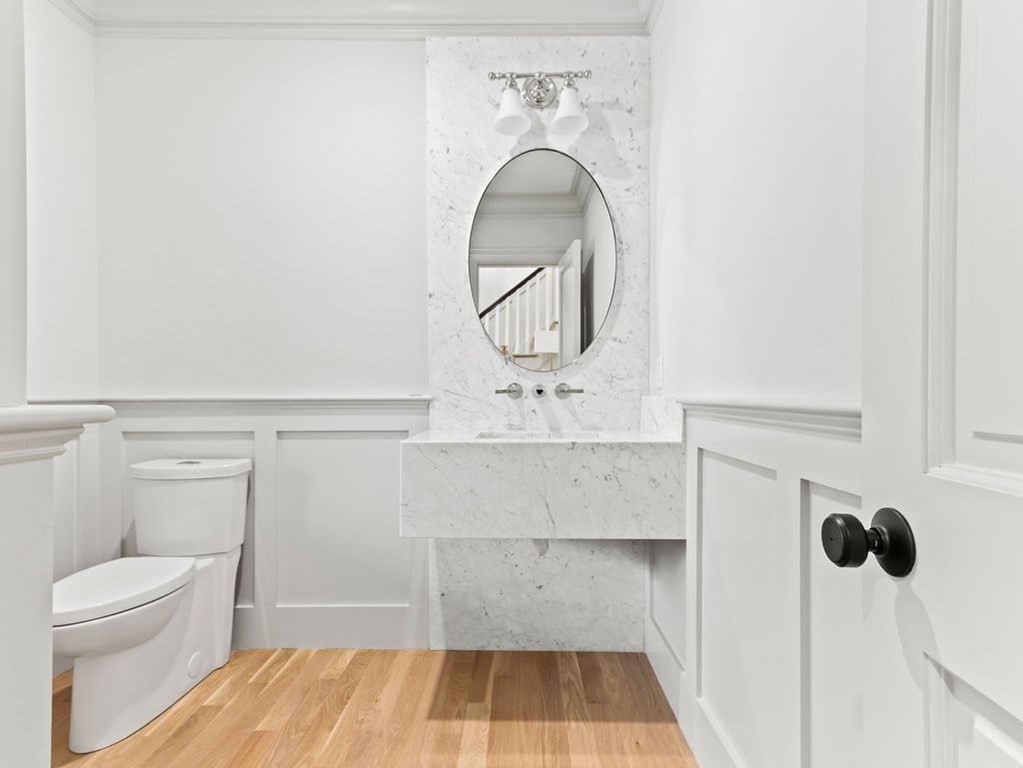 31 Karen Road Newton, MA 02468 - Photo 19 of 41 a bathroom with a sink a toilet and shower