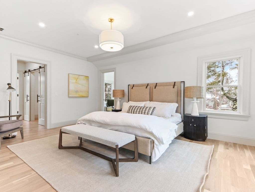 31 Karen Road Newton, MA 02468 - Photo 21 of 41 a spacious bedroom with a bed and window